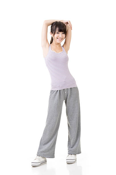 istock Fitness asian girl doing stretch exercise 499754725