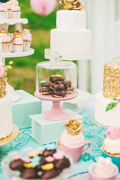 istock Dessert table with pretty cakes and cookies 499755393