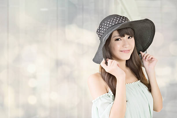 istock Elegant asian woman with hat 499756127