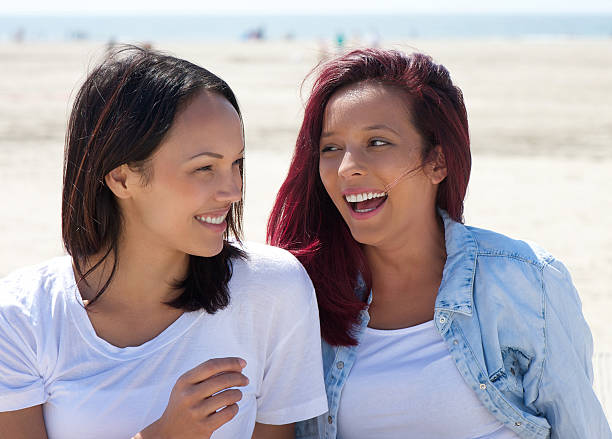 istock Girlfriends smiling outdoors 499756203