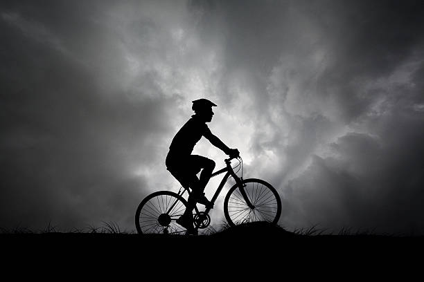 istock Cyclist Riding in a Storm 499756221
