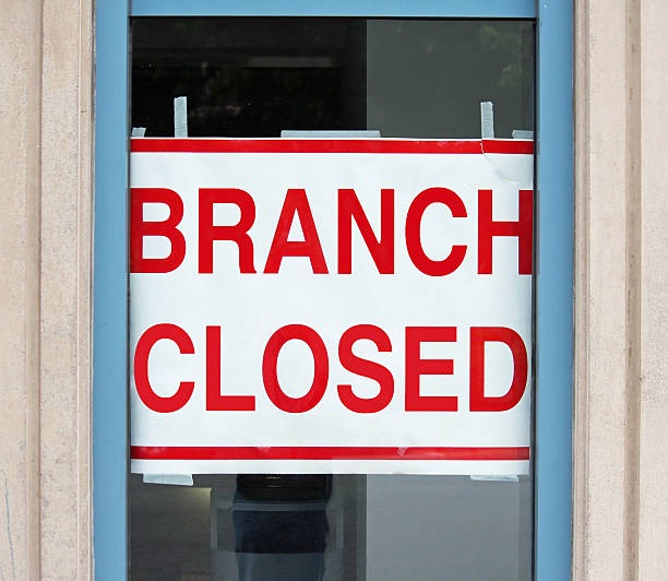 Branch Closed A sign in a store window reading Branch Closed closed sign stock pictures, royalty-free photos & images