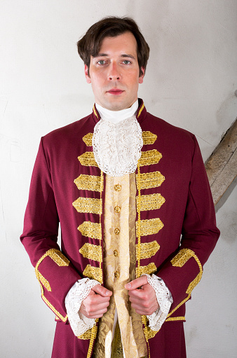 portrait of a nobleman in a red livery