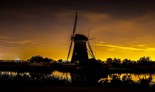 istock Picturesque landscape with windmills 499757517
