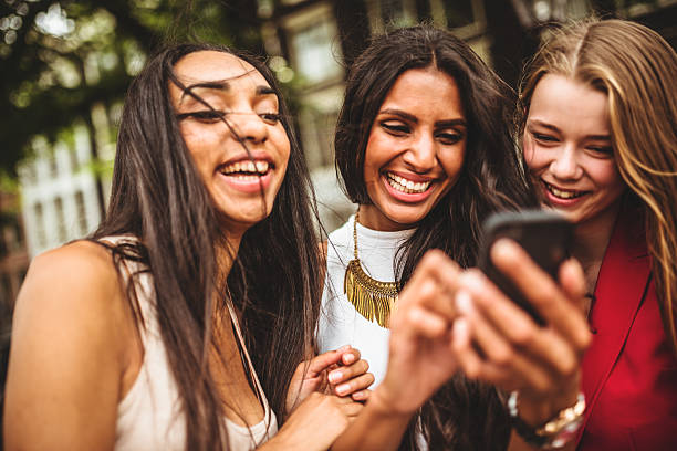 istock Couple of friends using the phone 499757593