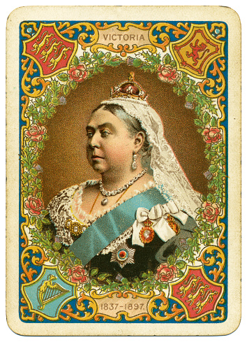 This illustration shows a portrait of Queen Victoria of England on the reverse of an antique / vintage playing card. The pack of cards was produced by Goodall in 1897 to celebrate Victoria's Diamond Jubilee, 60 years as Queen of Britain and its overseas dominions. The portrait is a copy of one produced in 1890 by Heinrich von Angeli, in which she wears the Coronation necklace and earrings, and small diamond crown. The card is decorated with emblems representing England, Scotland and Ireland (rose, thistle and clover leaf, for example). The court cards (picture cards) display former monarchs of Britain, along with their names and dates, and this pack was issued without a joker. Words written on this card reverse / back: VICTORIA 1837–1897 Links to more stock images of playing cards:.