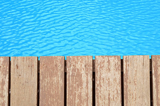 istock part of swimming pool with blue water 499759315