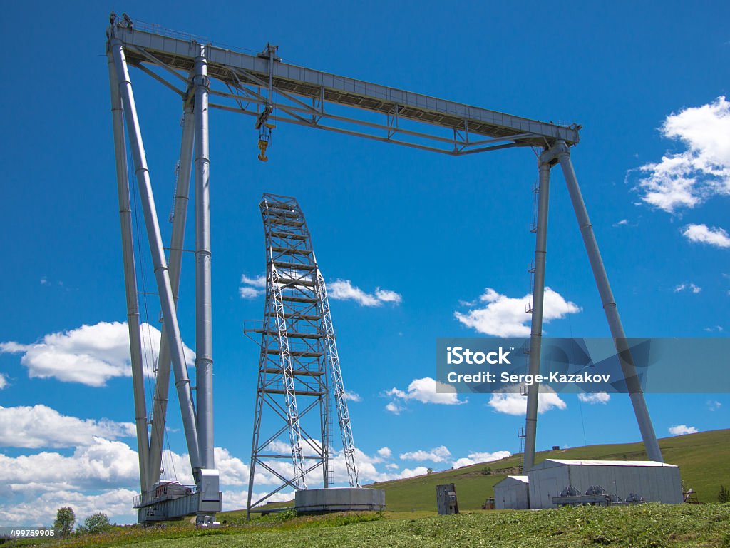 Large construction crane on sky background Arranging Stock Photo