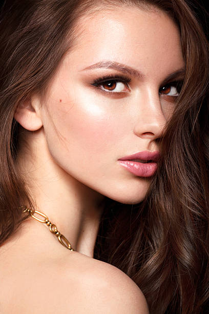 istock Beautiful young model with bright makeup and natural lips 499760303