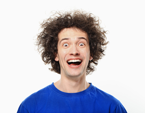 Crazy young man portrait with afro.