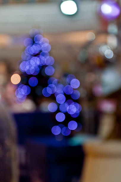 istock bokeh blurred out of focus background Christmas fir tree 499761775
