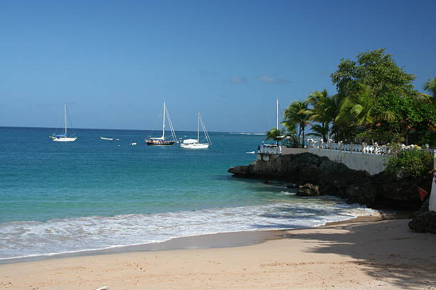 istock Yachts anchored in ocean 499770920