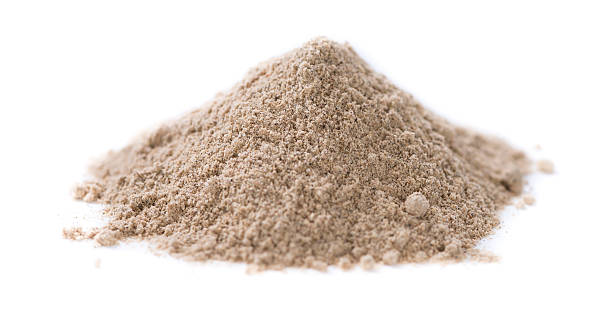 istock Cardamon Powder over white 499771154