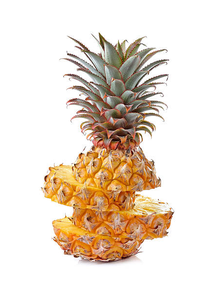 istock Juicy ripe sliced pineapple isolated on white background 499771790