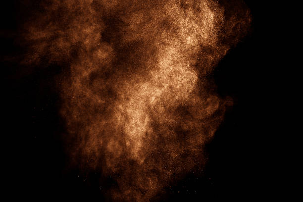 istock Abstract design of powder cloud against dark background 499772162