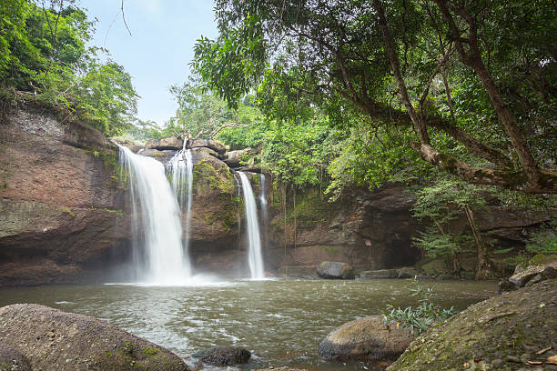 istock Natural water fall flare in the forest mountain. 499773848