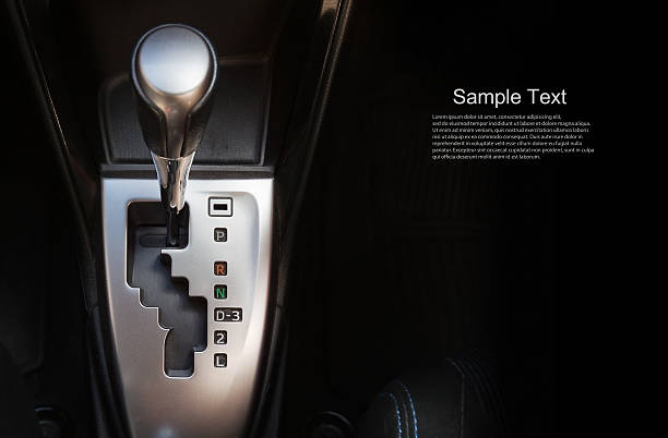 Close up gear stick interior inside bright car. Close up gear stick interior inside bright car. gearshift photos stock pictures, royalty-free photos & images