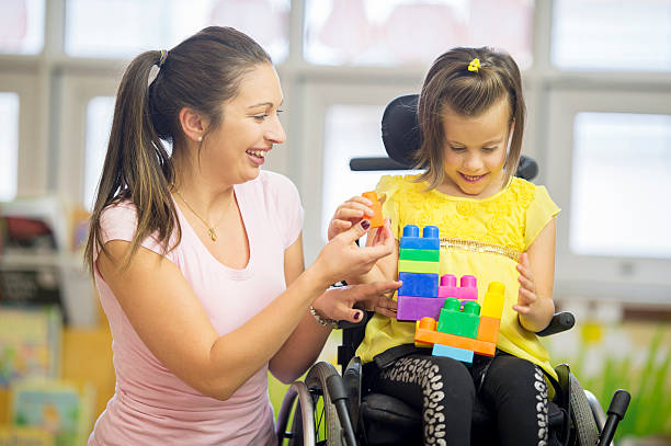 istock Disabled Girl Working on Motor Skills 499776502