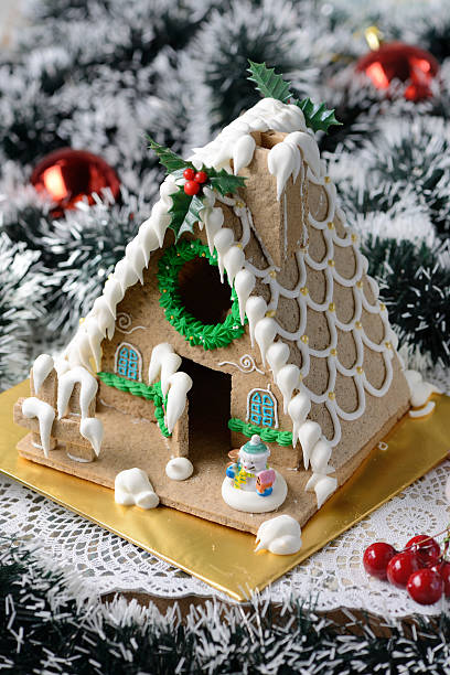 istock gingerbread house over Christmas decoration 499777056
