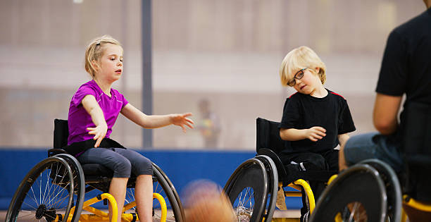 istock Dribbling Basketballs to Each Other 499777832