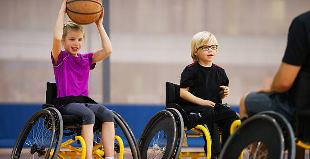 istock Disabled Girl Passing a Basketball 499778042