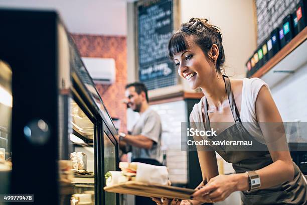 Preparing The Food Display Stock Photo - Download Image Now - Cafe, Owner, Occupation