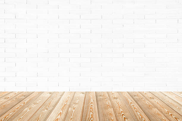 istock interior room with brick wall and wood floor 499780176