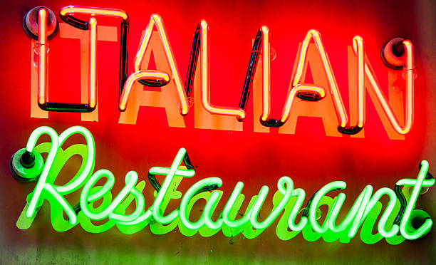 Italian restaurant neon advertising sign stock photo