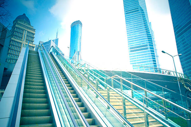 istock escalatorat an outdoor shopping mall 499782245
