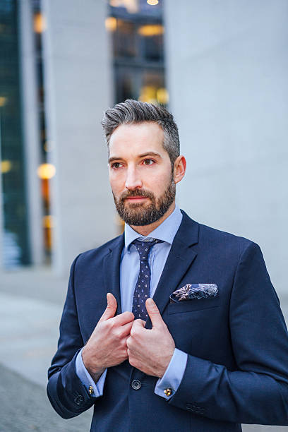 istock well-dressed businessman outside 499783124