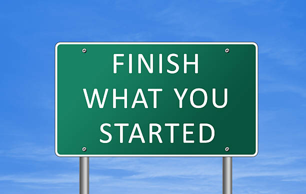 istock Finish what you started - road sign concept 499784033