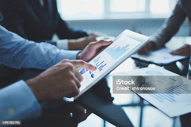 Analyzing Electronic Document Stock Photo - Download Image Now - Report - Document, Finance, Business