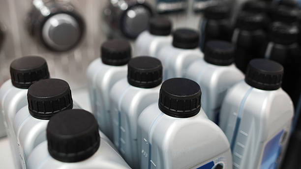 istock Motor oil in plastic bottle. Store showcases 499798790