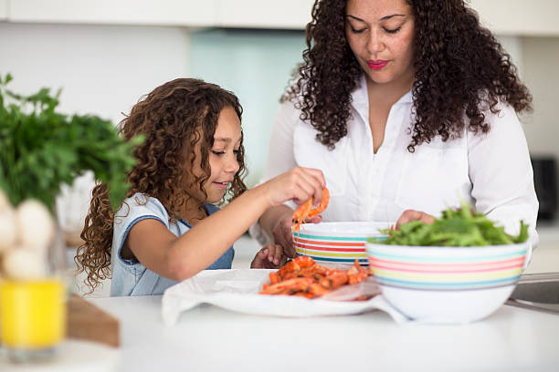 istock Mother and daughter in the kitchen 499799892