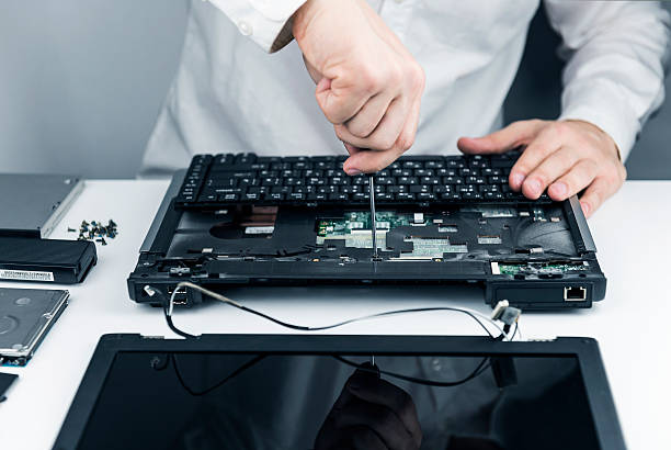 istock man repair laptop 499804148