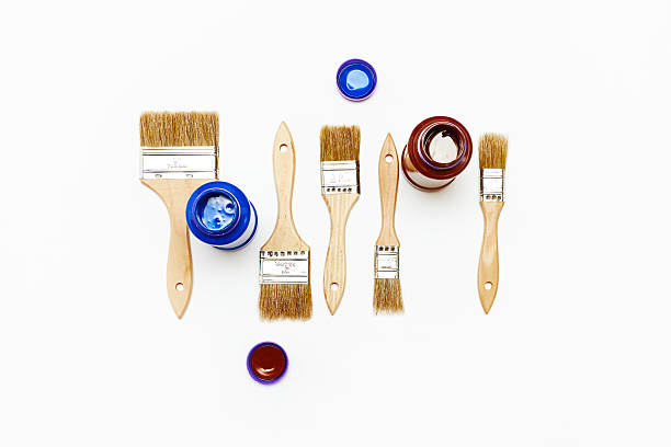 istock Set of five new renovation brushes with paint 499805281