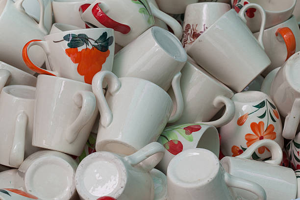 istock ceramic cups in a basket at the fair 499805781