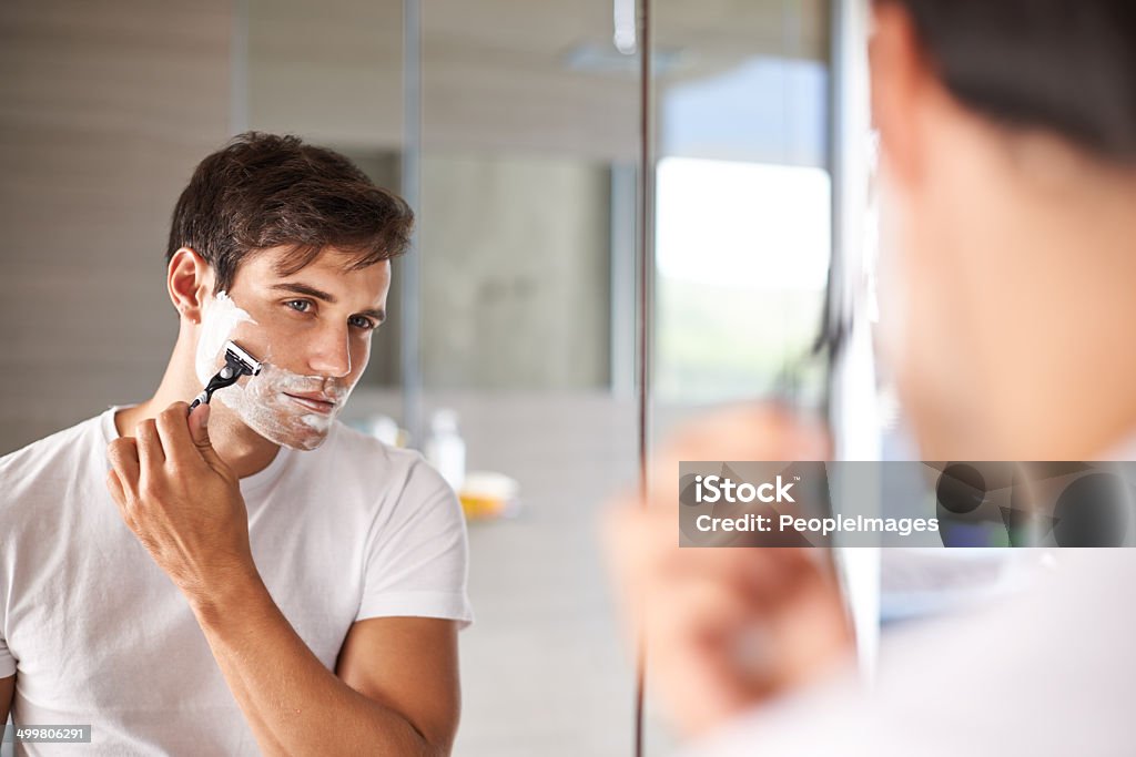 Getting the closest shave possible Shot of a reflection in the mirror of a man shaving his facial hairhttp://195.154.178.81/DATA/i_collage/pi/shoots/783523.jpg Shaving Stock Photo