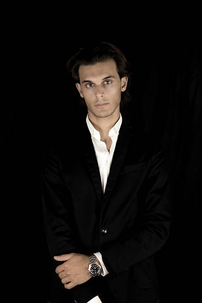 istock Studio portrait of elegant boy in black 499806660