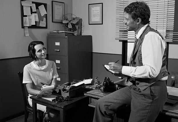 istock Vintage director and secretary working in the office 499807256
