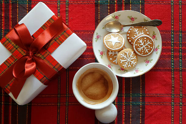 Christmas cookies with coffee cup, top view