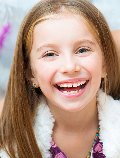 istock little girl smiling 499808649
