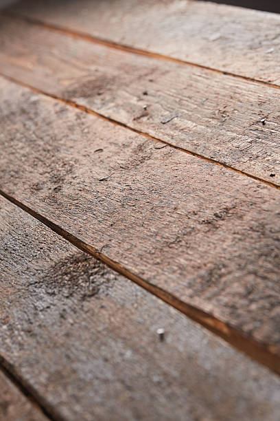 istock texture of a dark wooden board 499809304