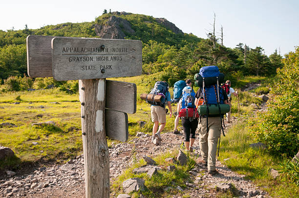 Backpacking in Grayson Highlands State Park, Virginia A group of friends begin a three-day hike on the Appalachian Trail, starting in Grayson Highlands State Park at Elk Garden, on Highway 600. The first night will be spent near Mount Rogers. appalachian trail photos stock pictures, royalty-free photos & images