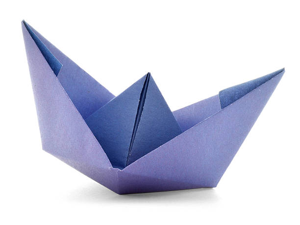 istock Native paper ship, origami sail boat isolated on white background 499810094