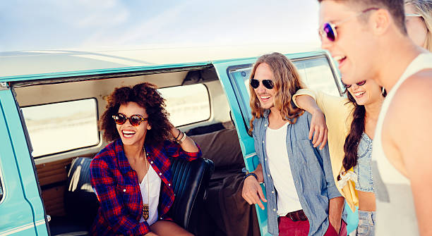 istock Group of friends in camper van 499810571