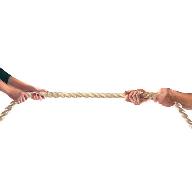 istock Hands of people pulling the rope Competition concept 499810696