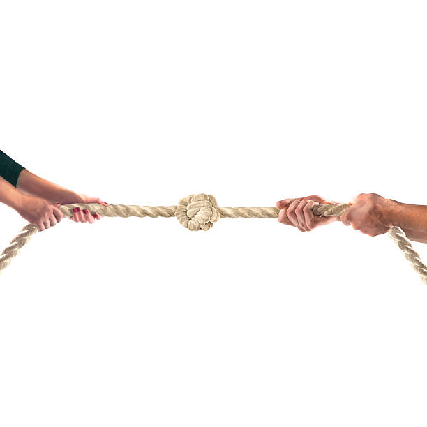 istock Hands of people pulling the rope Competition concept 499811406