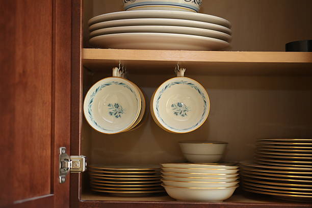 blue porcelain china in cabinet stock photo