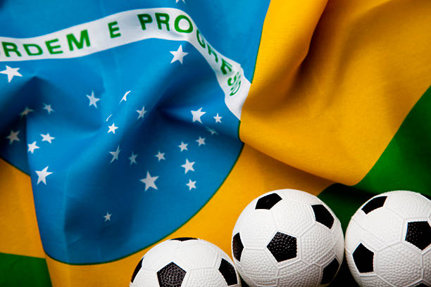 istock Brazilian flag with football 499811689